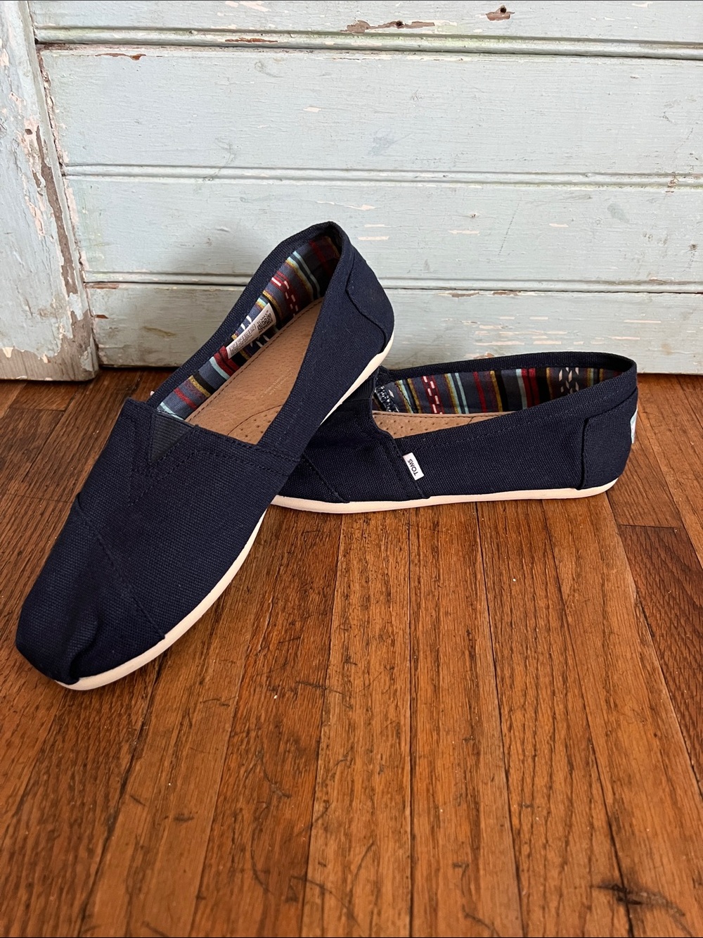 Women’s Toms Navy Canvas Slip-On Flats